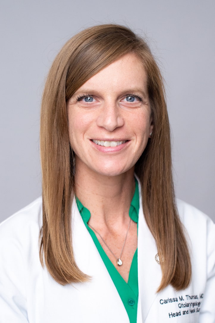 Headshot of Dr. Carissa Thomas, MD (Assistant Professor, Otolaryngology) in white medical coat, 2019.